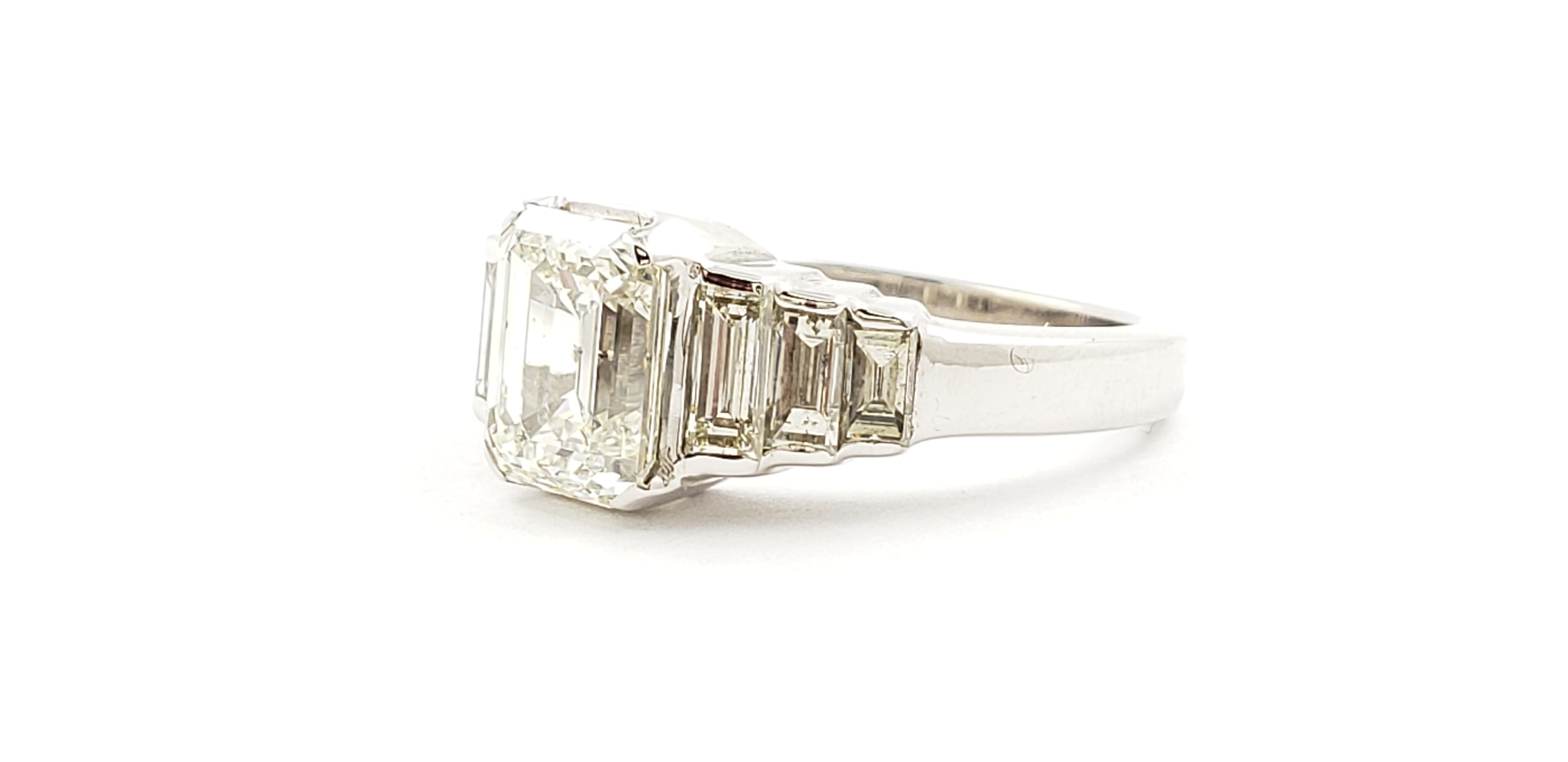 Emerald Cut Diamond Ring with Side Baguette Shape Diamonds